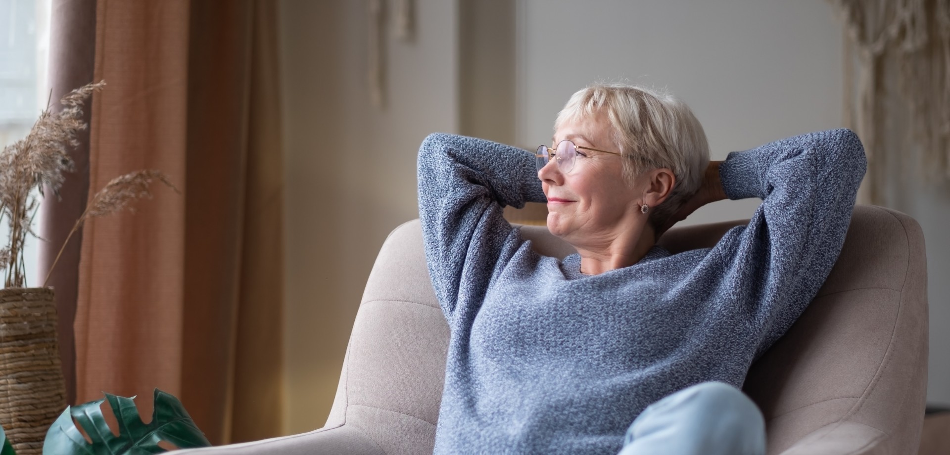 Acupuncture of Iowa Iowa City home slider woman sitting in chair