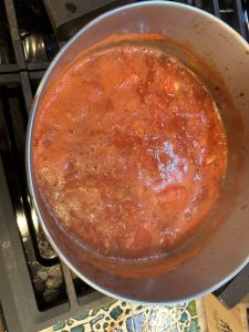 Large pot of tomatoes cooking